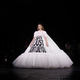 A model wears a creation for the Viktor and Rolf Spring/Summer 2019 Haute Couture fashion collection presented in Paris, Wednesday Jan. 23, 2019. (AP Photo/Thibault Camus)